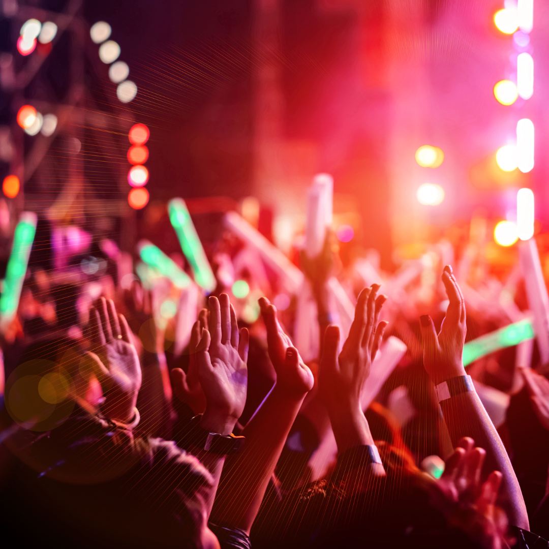 hands of a crowd at a concert